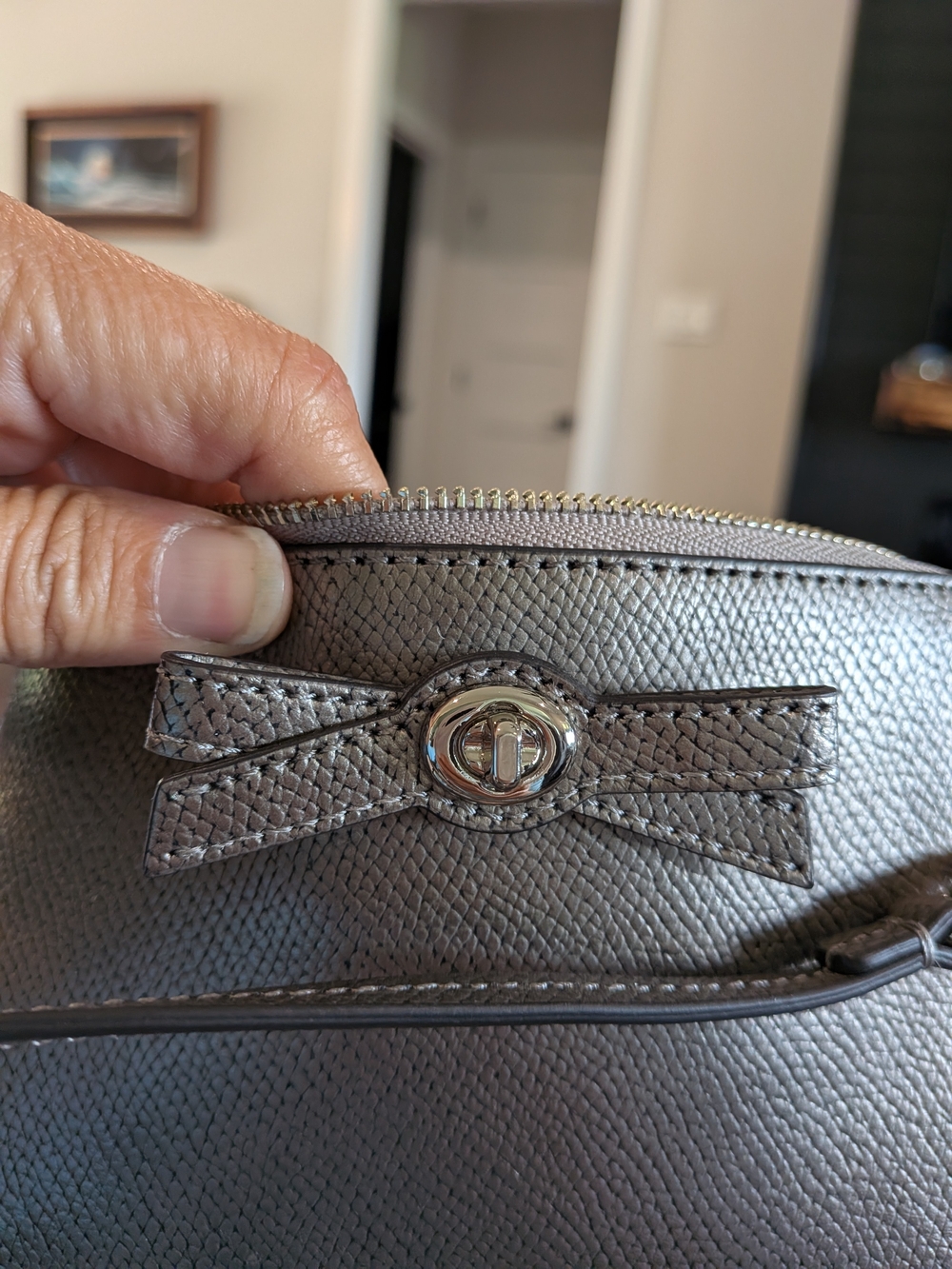 Coach Metallic Silver Bow-Accent Wristlet